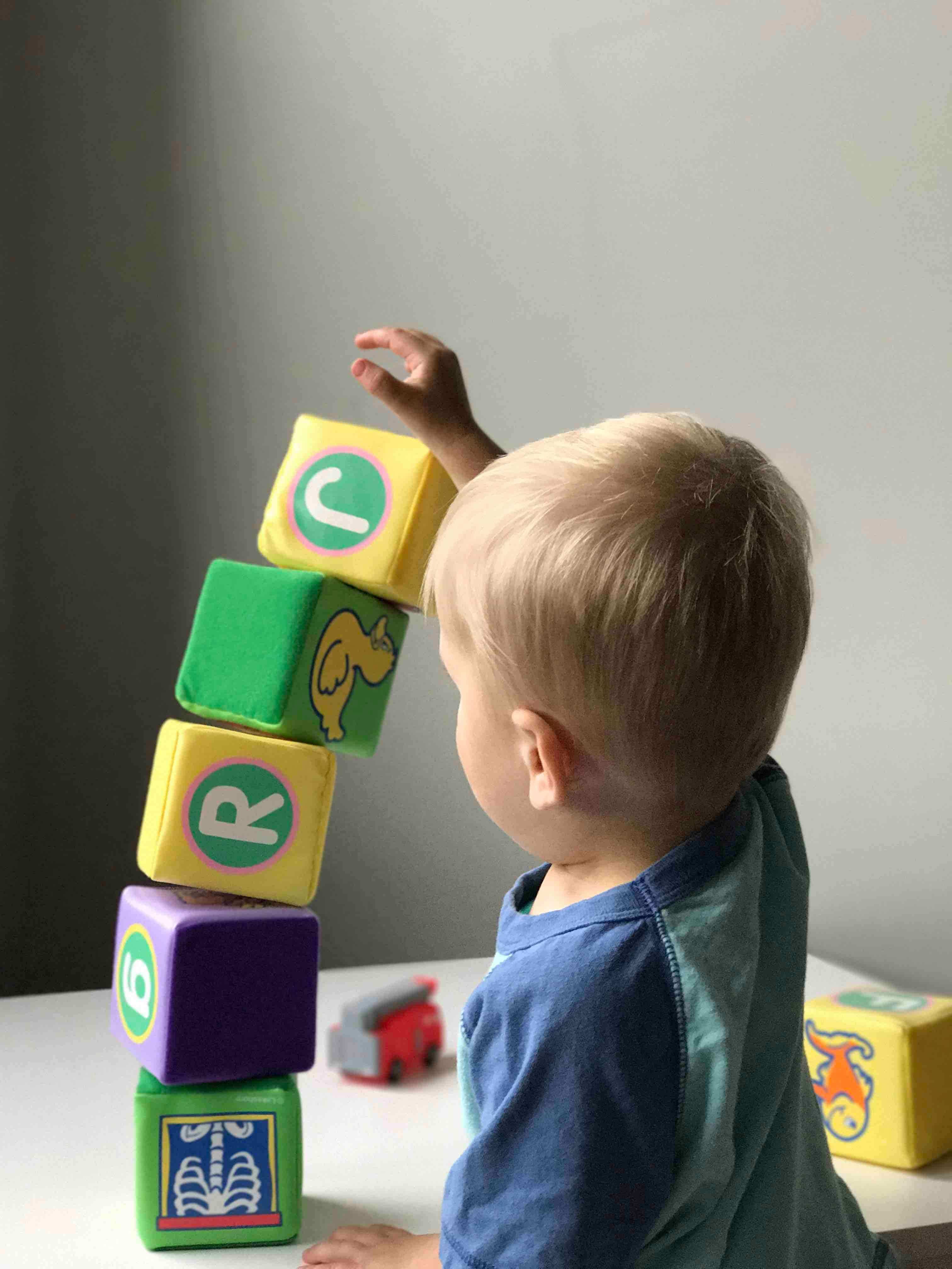 Boy playing with cubes