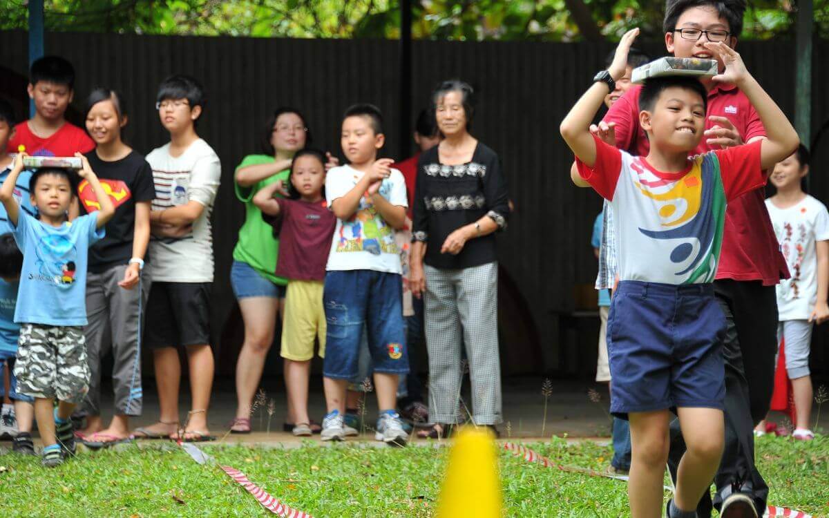 Children playing team games outside